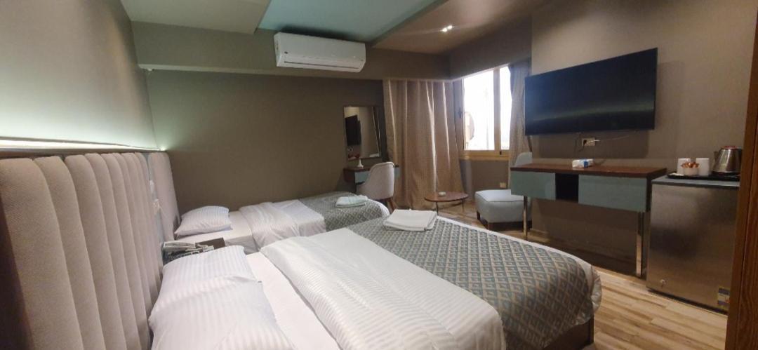 Grand Bayan Hotel & Apt At Nile Plaza カイロ 部屋 写真