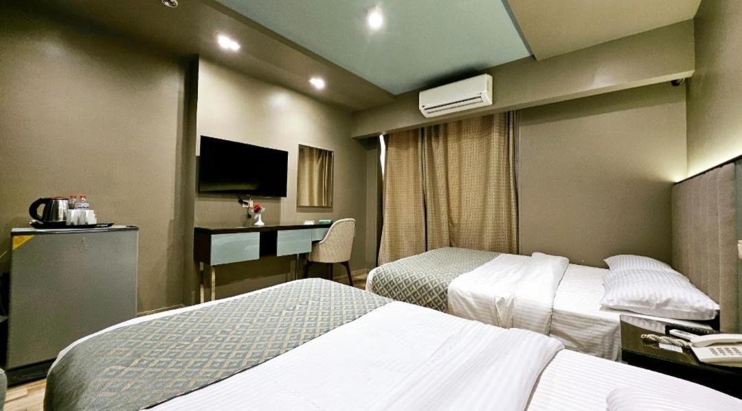 Grand Bayan Hotel & Apt At Nile Plaza カイロ 部屋 写真