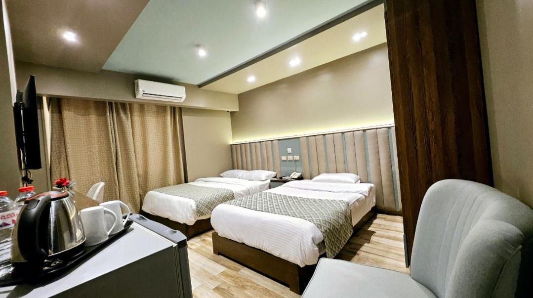 Grand Bayan Hotel & Apt At Nile Plaza カイロ 部屋 写真