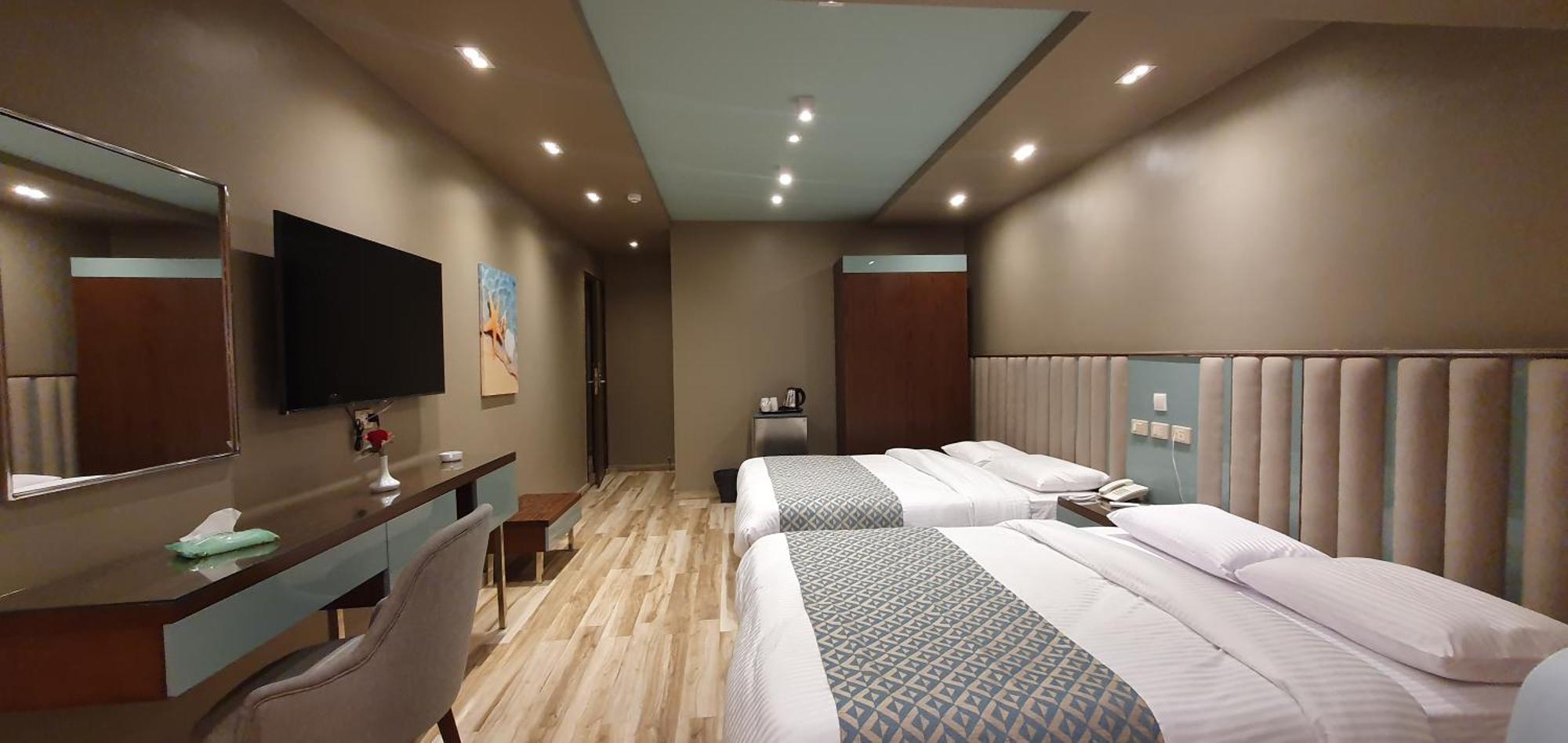 Grand Bayan Hotel & Apt At Nile Plaza カイロ 部屋 写真