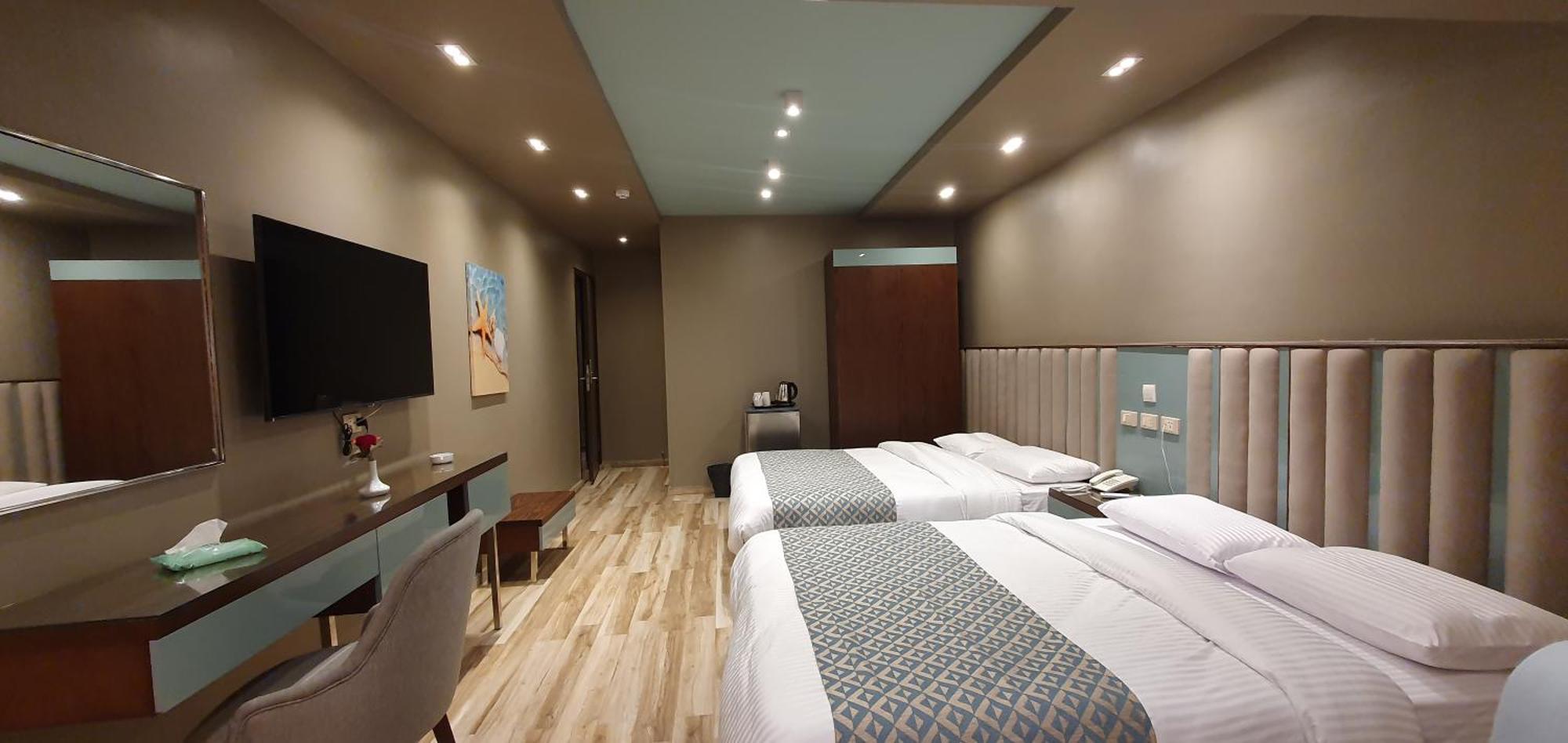 Grand Bayan Hotel & Apt At Nile Plaza カイロ 部屋 写真